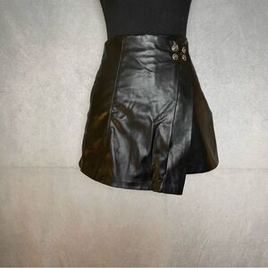 Black faux leather mini skort with gold button detailing size xs